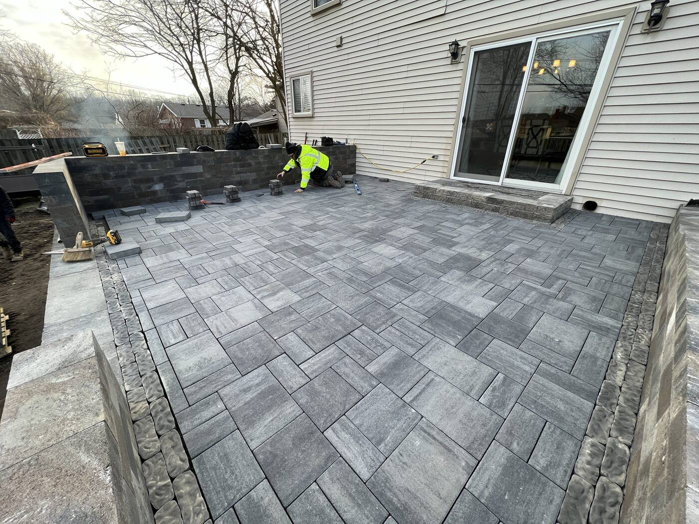 Our crew laying a patio