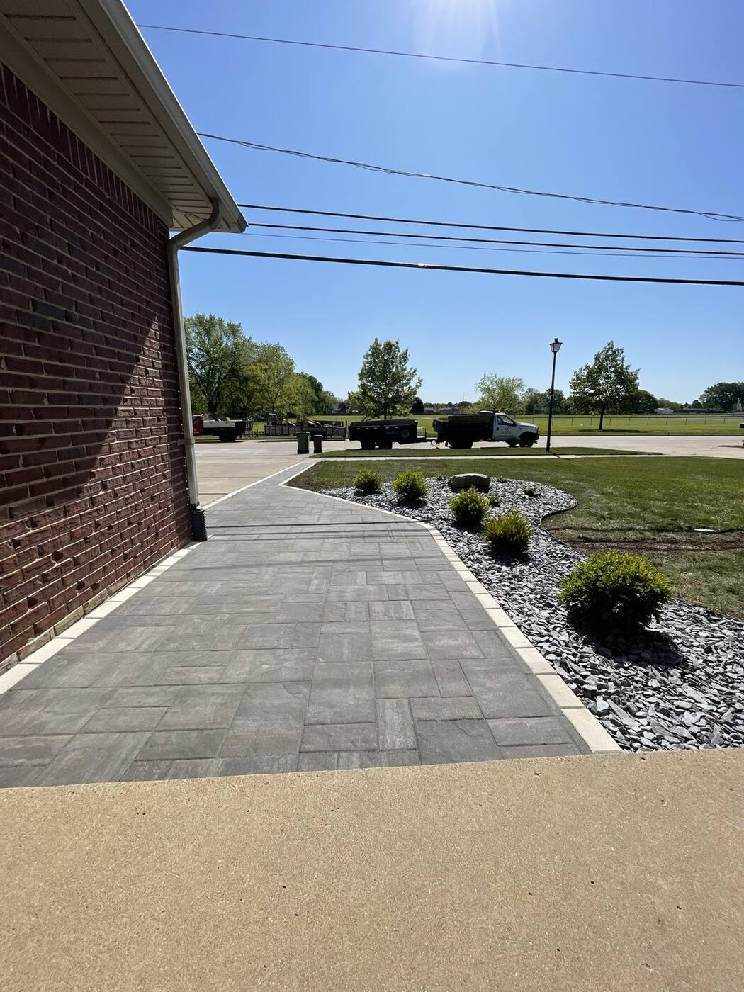 Paver walkway with border and slate rock beds