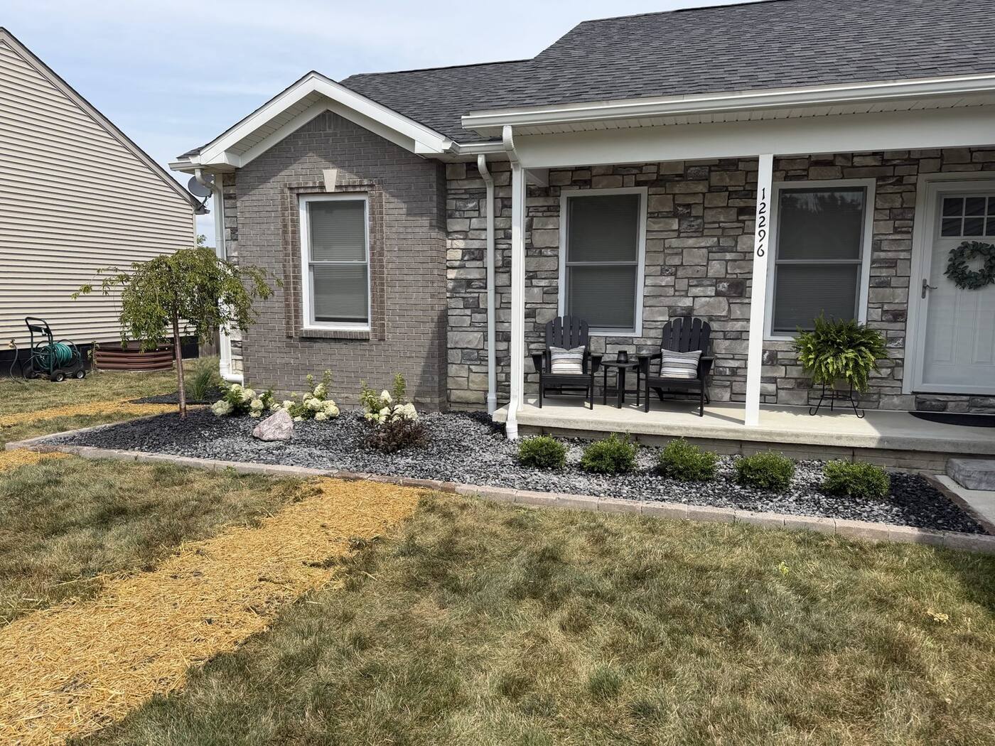 Slate rock front bed with paver border